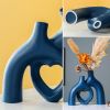 Snuggle Hollow Ceramic Decorative Vase